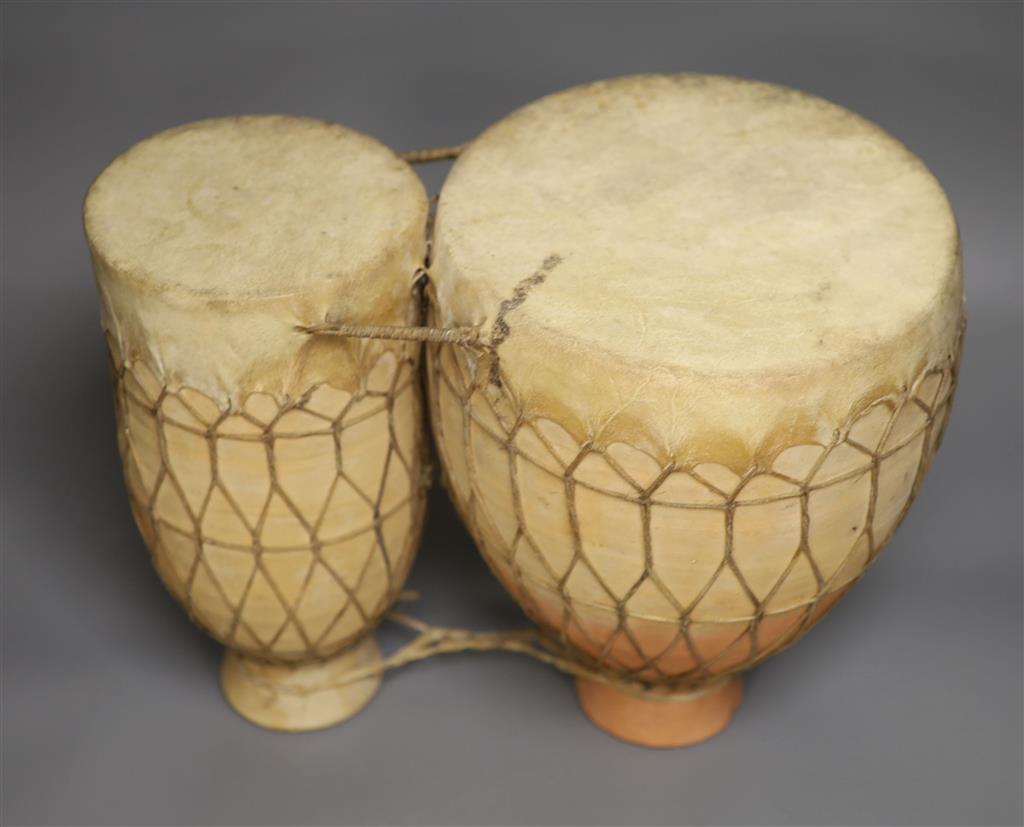 A pair of Moroccan strapped clay drums (Tbila)